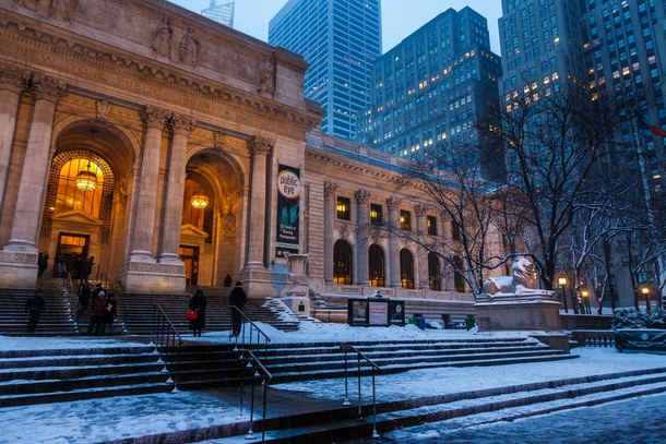 The th Ave NY Public Library in light snow this evening 