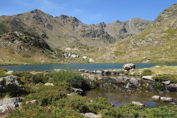 The uppermost Tristaina Lake in the Pyrenees Mountains Andorra 