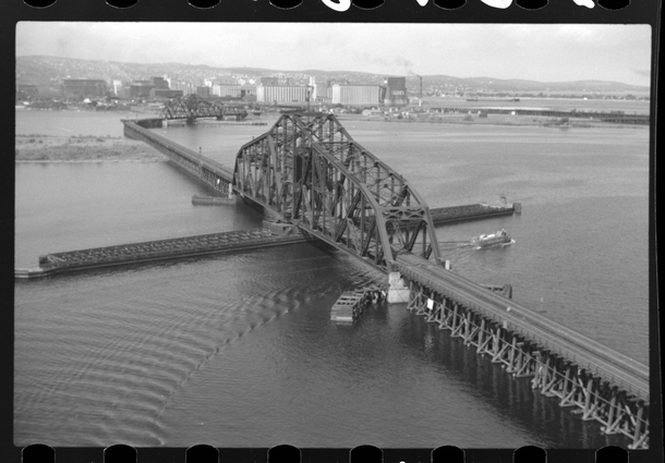 The Wisconsin Draw closest and the Minnesota Draw railroad bridges connected Superior with Duluth Minnesota Completed in  both bridges were removed during the late s as they were deemed detrimental to navigation of the newer  lake boats August  by John Va