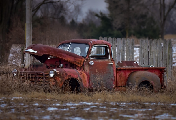 This abandoned Chevy truck in a farmers field