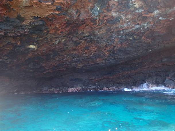 This is a small cave that was created from lava rock being eroded by the waves near Kealakekua Bay HI 