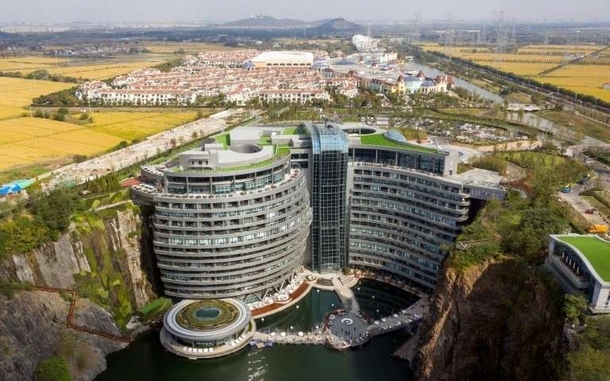 This is the InterContinental Shanghai Wonderland a hotel built into the side wall of an abandoned quarry