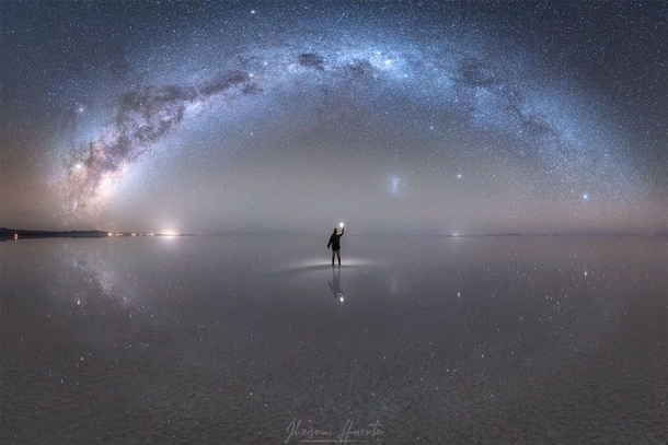 This picture is composed of  vertical frames taken consecutively over ten minutes from the Uyuni Salt Flat in Bolivia by Jheison Huerta in early April  After a rain the flat can become the worlds largest mirror -- spanning  kilometers