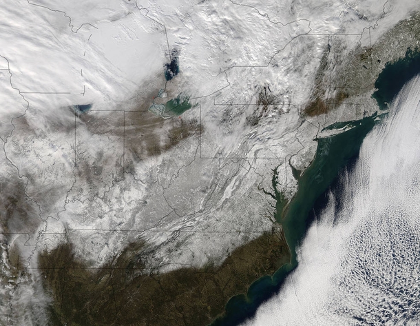 This visible image from the MODIS instrument aboard NASAs Aqua satellite on Jan  at  UTC  pm EST shows post-storm snow on the ground across eastern United States Credits NASA Goddard MODIS Rapid Respons 
