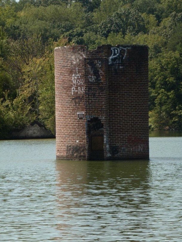 This waterlogged silo is one of many that can found on the Tellico Lake They are the remants of farms flooded by the TVA in  following the construction of the controversial Tellico Dam Vonore TN area