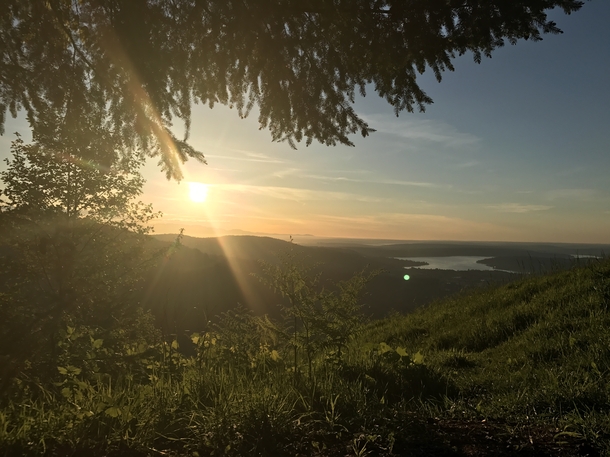 Tired of over saturated photos Heres some raw beauty of Lake Sammamish above the Northern side of Squak Mountain with the Olympics peaking out in the background 
