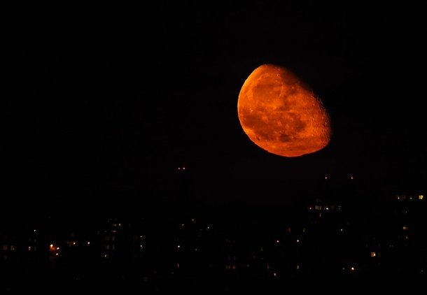 Tonight Moon rising above Prague city