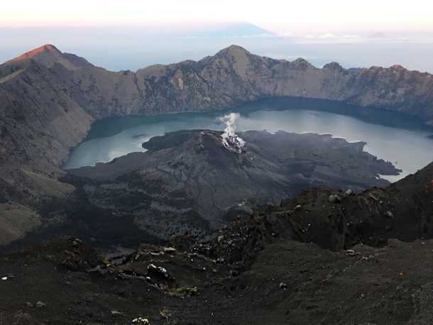 Took this from the top of Mount Rinjani Indonesia Hands down THE most taxing experience of my life The view of an active still smoking volcano made it worth the effort though  