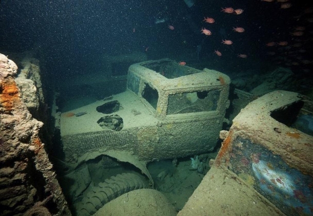 Trapped Classic British vehicles submerged near Egypt