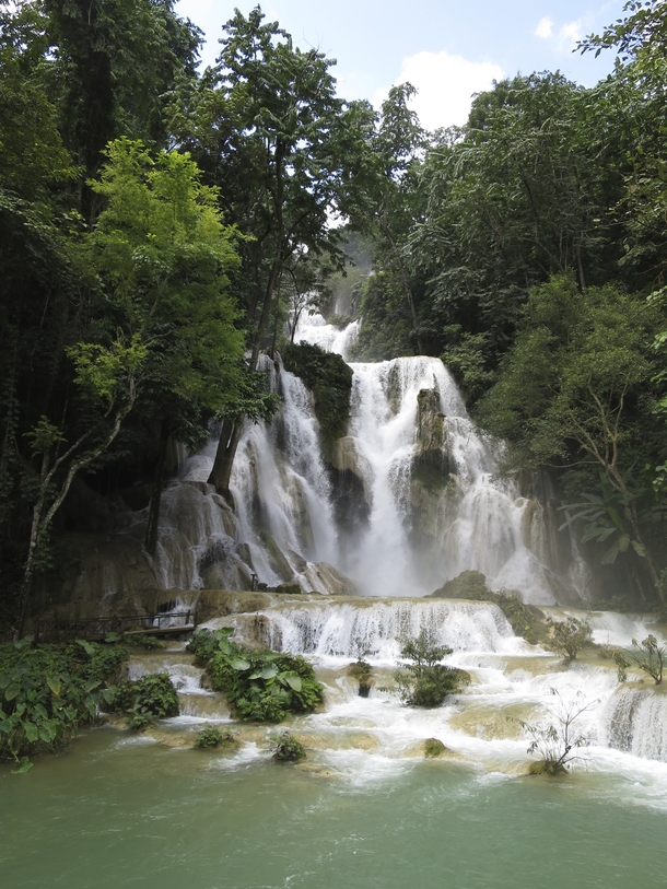 Travelling in SE Asia You have to visit Kuang Si Falls in Laos There are some great swimming holes further down too  By F Buxton
