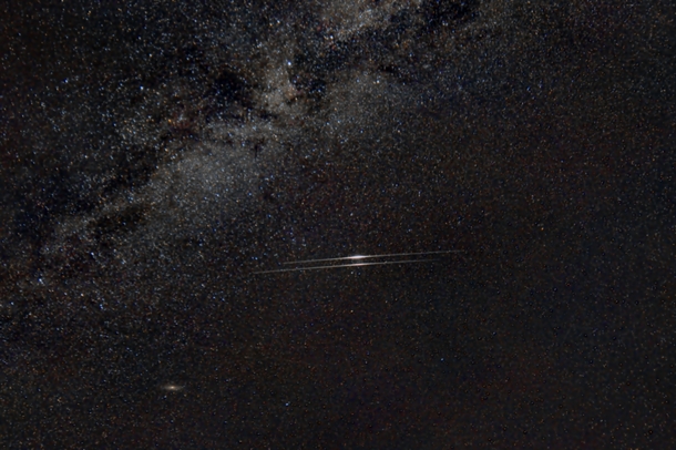Twin Iridium Flares under the Milky Way with M in the lower left 