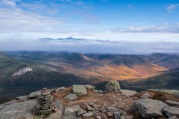 Undercast over fall colors Mt Washington New Hampshire as viewed from Mt Lafayette 