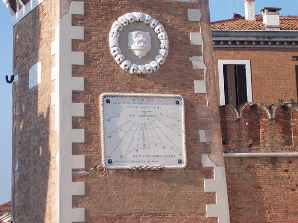 Vertical sundial in Venice Italy 