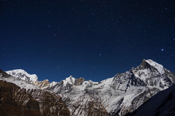 View at Annapurna Base Camp Nepal on a moonlit night x 