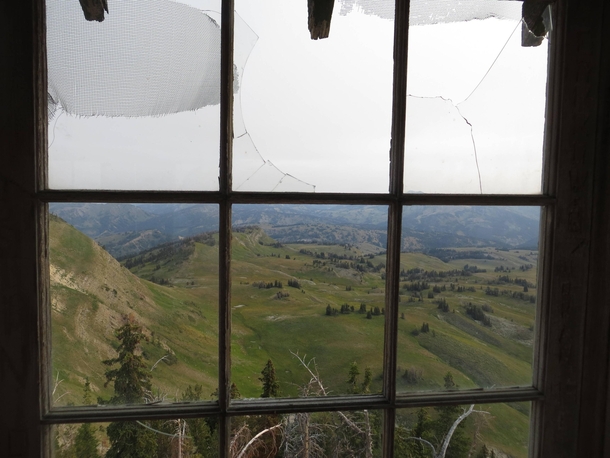 View out of an abandoned fire lookout on Deadman Mountain in Wyoming 