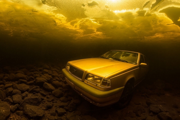 Volvo under water in lake Saimaa Finland 