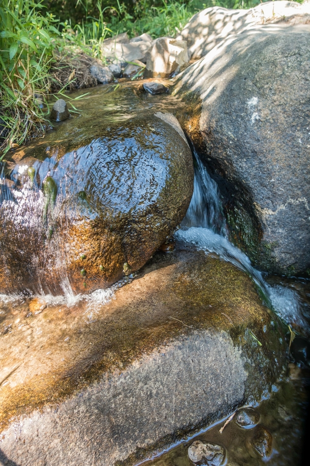 Water flowing between rocks at Coulon Park in Renton Washington 