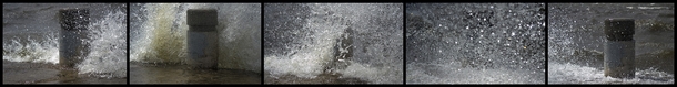 Waves washing over a bollard on the shore of Lake Mendota Madison WI 
