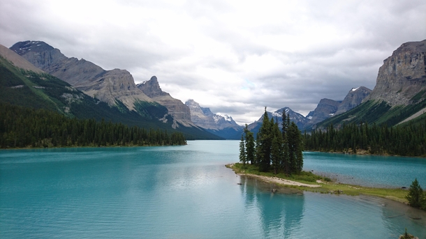 Went to Maligne Lake this summer This is taken with my cellphone No edit or filter and no corrections of any kind It looks like this to the eye x OC
