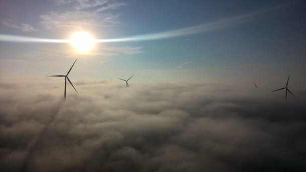 Wind farm in Nebraska on a foggy morning 
