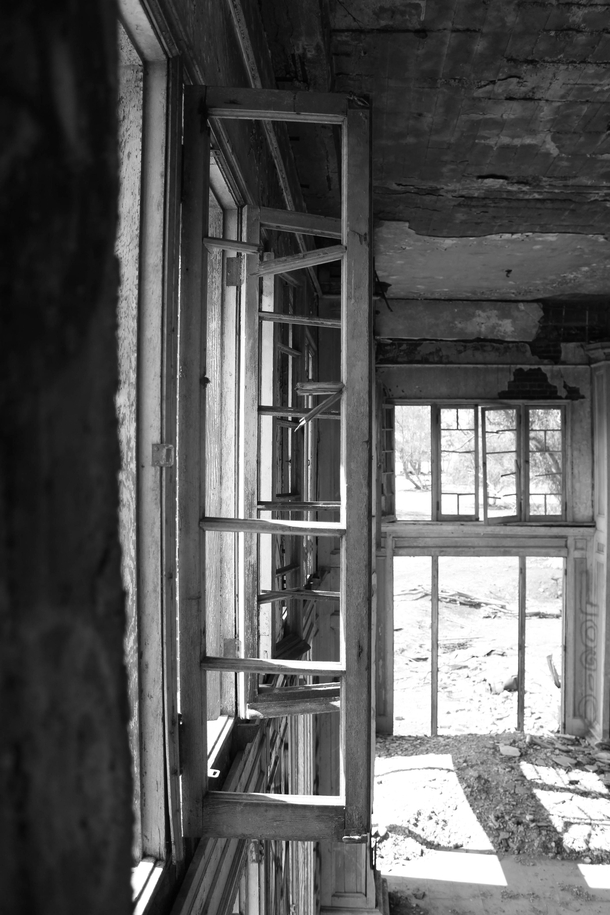 Windows abandoned hotel in Byron California 