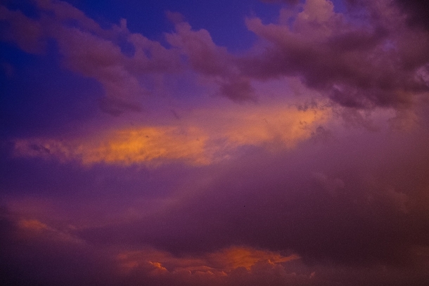 Yellow and violet clouds during sunset