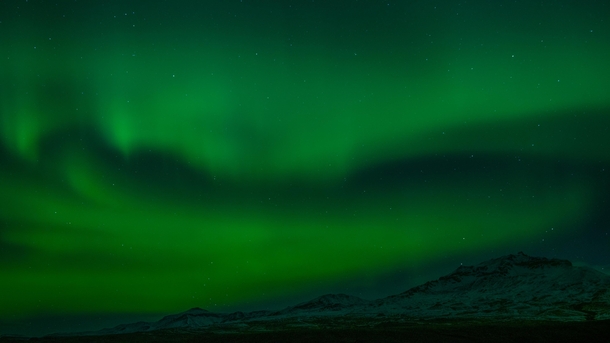 Yesterday northern lights over mountains seen in rsmrk Iceland  zbigniewwuu