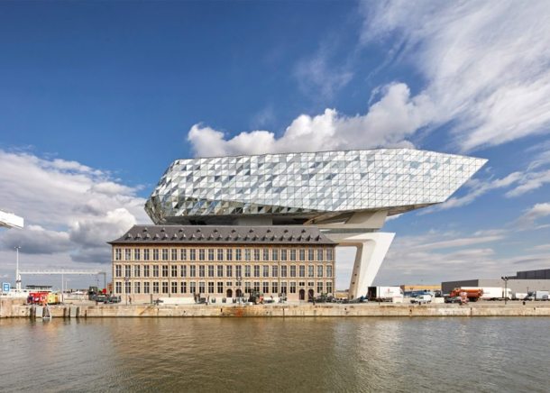 Zaha Hadid Architects designed huge faceted glass volume to sit on the roof of Antwerp port building