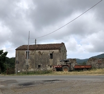  Abandoned house and tractor from southern Italy