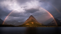  Rainbow bright Here a pretty picture I shot about a week ago now while visiting Glacier National Park for the first time Have a happy Friday evening and weekend OC  IG wwwinstagramcomjohn_perhach_photo