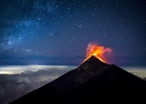  second night exposer of the stars and eruption of Volcn de Fuego in Guatemala