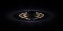  Solar Eclipse from behind Saturn The light above the left end of the ring is the Earth