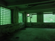  Strange room with green tinted windows found inside an old factory