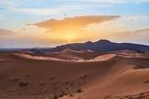  Sunrise over the dunes of the Sahara desert Moroccan side