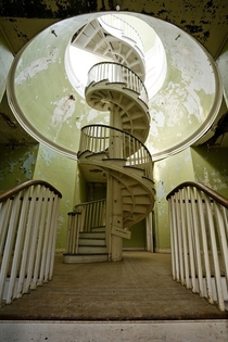  year old spiral staircase in Virginia insane asylum that was birthplace of American eugenics movement 