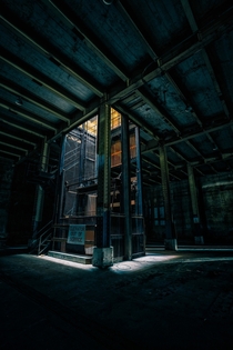A broken elevator in an abandoned naval fuel depot 