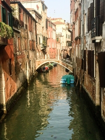 A building-lined canal in Venice Italy  x-post ritookapicture