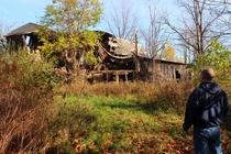 A collapsed barn in small town Michigan Feat My Dad
