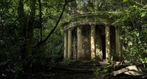 A colonnade in the grounds of the abandoned Baron Hill mansion in Anglesey Wales