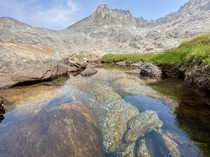 A crystal clear alpine lake in the Wind River Range WY 