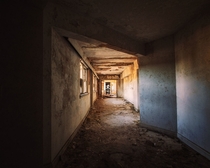 A decaying hallway inside of the abandoned Baker Hotel - Mineral Wells TX 