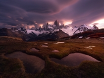 A dramatic display of lenticular clouds fills the sky as sun sets over the Fitz Roy Patagonia Chile  Photo by Ted Gore