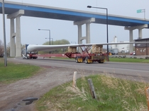 A  foot long wind turbine blade being transported in Duluth MN after having been unloaded from a ship 