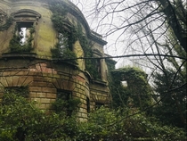 A forest reclaiming a Victorian mansion on Anglesey Wales
