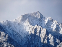A frigid-looking mountain in the eastern Sierras near Mount Whitney CA 