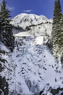 A frozen waterfall and Mt Rainier 