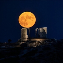 A full Moon rose behind the ancient temple of Poseidon which dates to  BC on Cape Sounion in Greece Credit Muhammed Muheisen