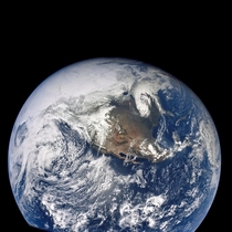 A good view of Earth photographed about one hour after trans-lunar injection of Apollo  on April   