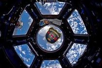 A local astronaut from my area recently went to the ISS and took a patch from my fire department to snap this awesome photo