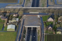 A new highway with tunnels to prevent interfering with the village 